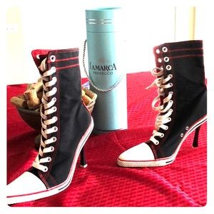 Harley Quinn like stiletto boots.